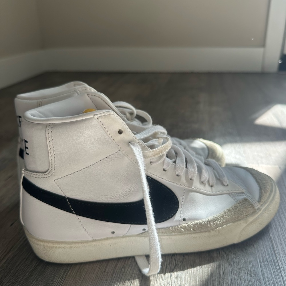 Nike Blazer White High-Top Sneakers with Black Swoosh